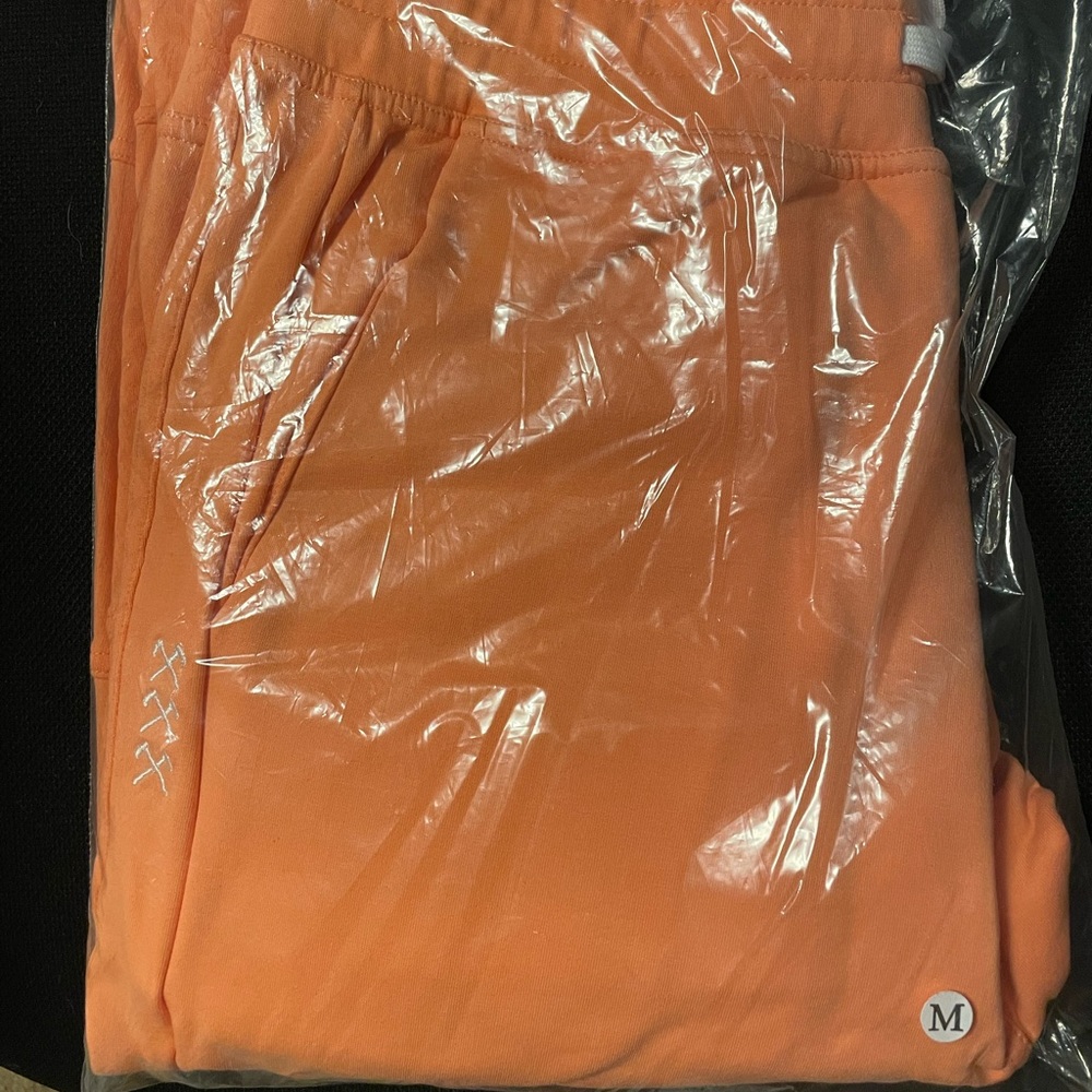 Sharpen the axe / Misfit Athletics coral joggers. Size medium NWT